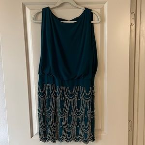 Forest green dress with gold beading. Size 10 dress.